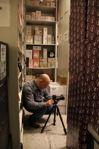 Adjusting equipment between exposures on a business shoot