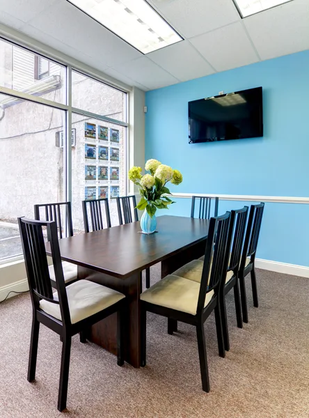 Conference table where closings are signed at the brokerage