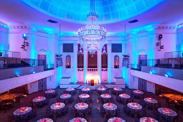 Venue exterior photographed before an evening event
