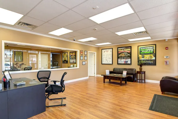 Sales counter with seating for private viewings