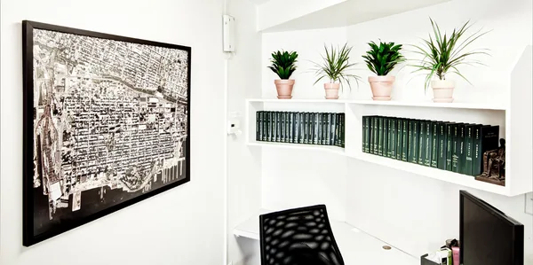 Framed bar admissions hung along the corridor