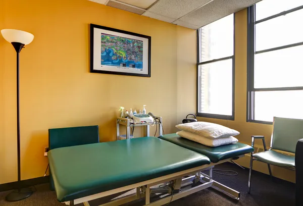 Hallway signage directing patients through the office