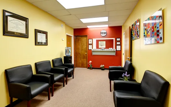 Dental practice interior looking down the treatment corridor