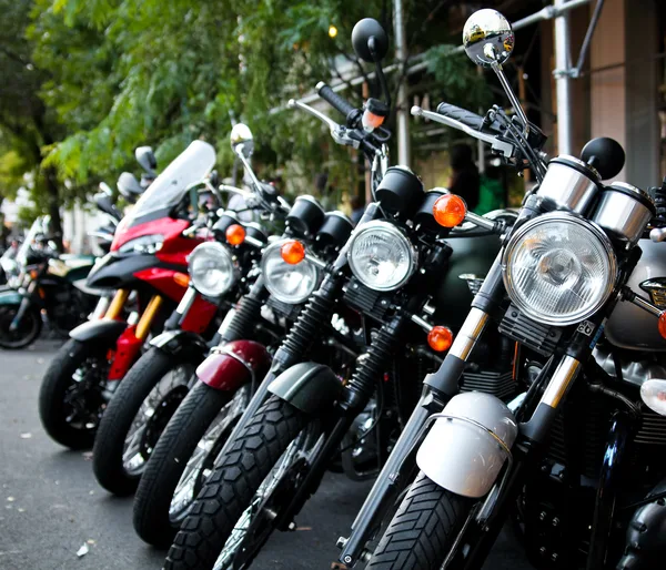 Vintage motorcycle displayed as the shop centerpiece