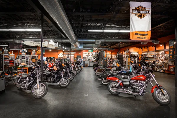 Touring motorcycle staged under showroom lighting