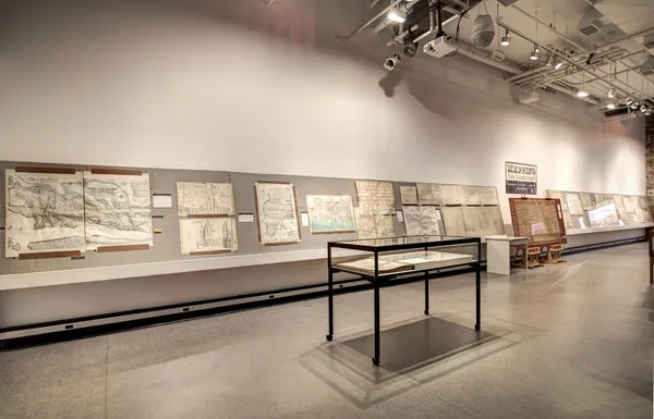 Interactive exhibit station in a visitor gallery