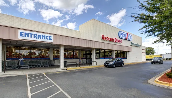 Shopping center exterior with anchor store frontage